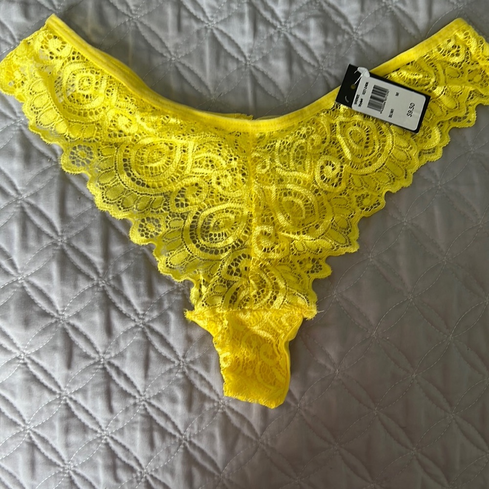 Brand new, yellow thong